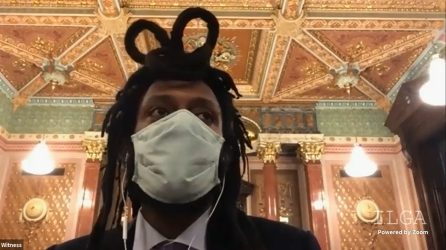  State Sen. Mike Simmons, D-Chicago, makes his case for amendment 1 to SB817 in the General Assembly. The bill would impose funding penalties on schools that keep policies in place that apply dress codes to hairstyles.