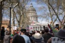 The protest march against President Donald Trump’s administration approaches the Utah State Capitol in Salt Lake City, March 28, 2026.
