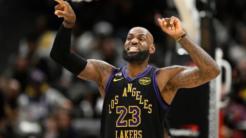 Los Angeles Lakers forward LeBron James gestures during the first half of an NBA basketball game against the Washington Wizards, Friday, Jan. 30, 2026, in Washington. (AP Photo/Nick Wass)