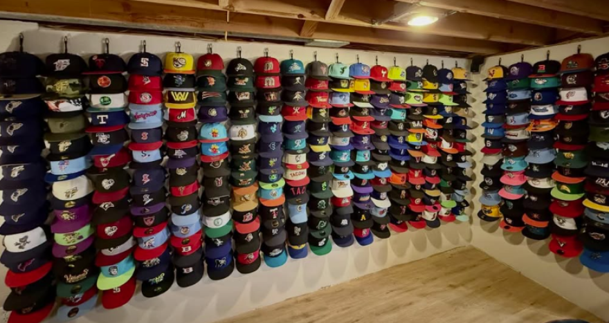 Wall of hats inside Erik the Peanut Guy's home. He says he has over 700 different hats. 