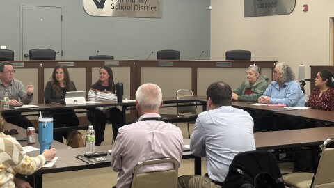 As the opening proposals by unionized Sioux City School District personnel were unveiled on February 25, 2026, the union personnel are shown at right and others pictured are school administrators. (Bret Hayworth, Siouxland Public Media News)