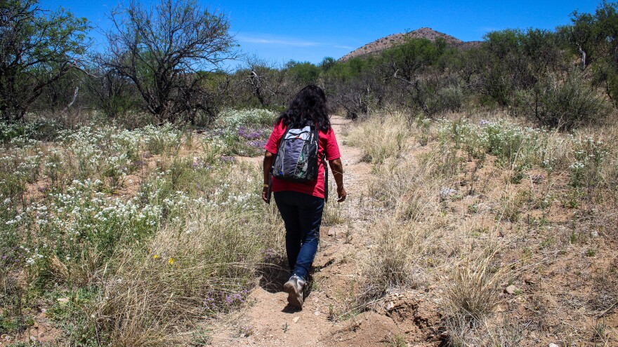 Maria Ochoa walks one of the trails she monitors with the Tucson Samaritans.