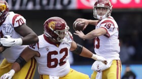 Southern Cal quarterback Matt Fink in action against Washington in an NCAA college football game Saturday, Sept. 28, 2019, in Seattle. (Elaine Thompson/AP)