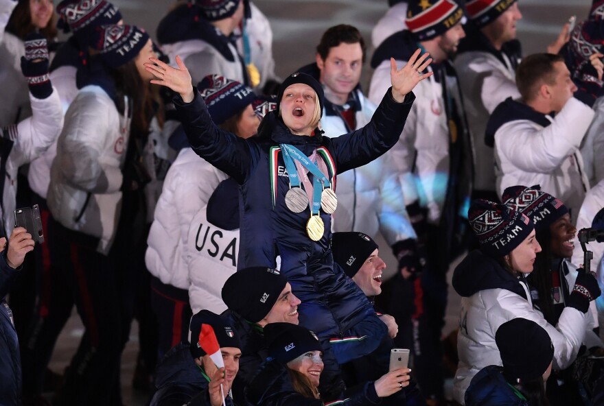 Four-time Olympian Arianna Fontana of Italy donned the gold, silver and bronze medals she won in the short track speedskating events in Pyeongchang.