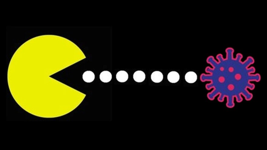 illustration shows a pac-man getting ready to eat a cartoonish germ on a black background