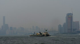 Wildfire occurring In Western United States and Canada causes hazy skies over the Midtown Manhattan skyscraper in the left side of East River and Long Island City in the right side on July 20, 2021 in New York City.