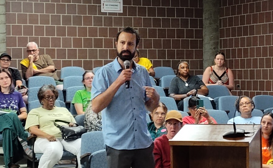 Ann Arbor mayoral candidate Yousef Rabhi speaks at the Ypsilanti Township Board of Trustees meeting on August 18, 2026.