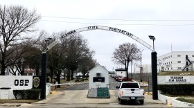 The front gate of the Oklahoma State Penitentiary in McAlester, shortly after the Feb. 17, 2022, execution of inmate Gilbert Postelle.