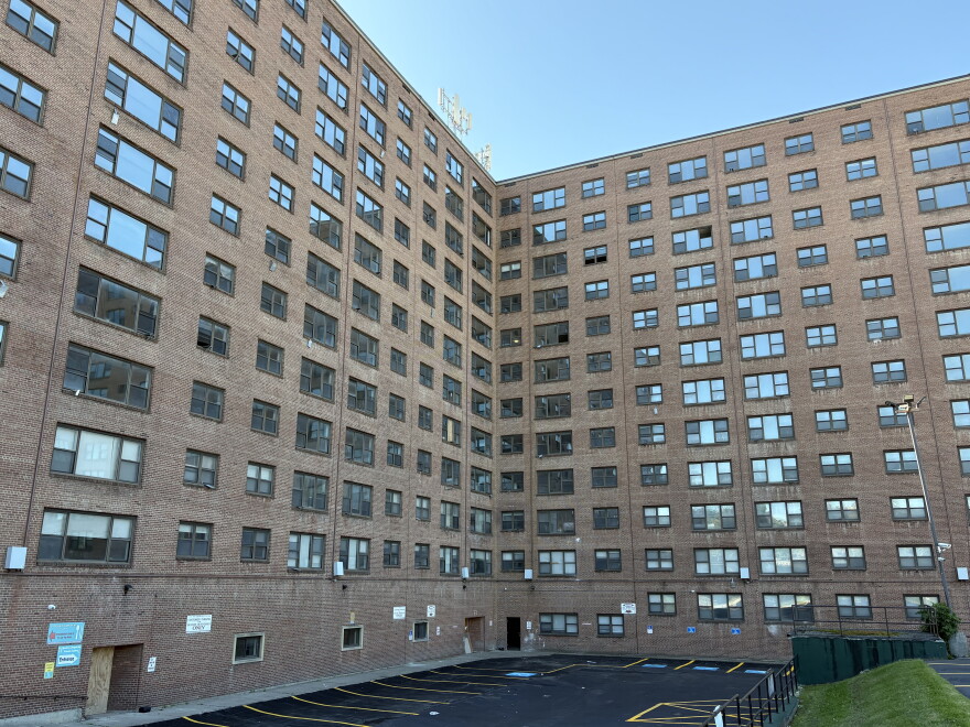 The rear of the Metropolitan facing Lodi St. Blinds in the lower floor windows are a sign those units are nearly ready for occupancy.