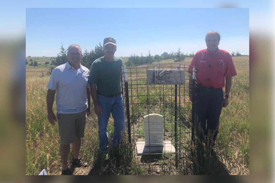 Rob Monson, Tom Heisinger and DeWayne Winter are friends who discovered a headstone buried in a Hutchinson County cattle pasture and restored it.