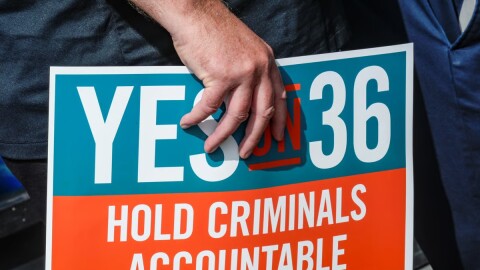 7-Eleven leadership and franchisees support the Yes on Prop 36 campaign outside the 7-Eleven that was robbed by about 50 juveniles in late September in Los Angeles during a news conference, Thursday, Oct. 10, 2024.