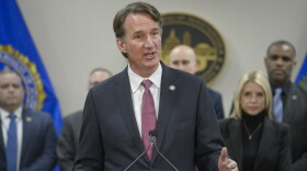 Virginia Gov. Glenn Youngkin speaks as Attorney General Pam Bondi, right, listens during a news conference about an MS-13 gang leader who was arrested in an operation by the Virginia Homeland Security Task Force, during a news conference at the Manassas FBI Field Office, Thursday, March 27, 2025, in Manassas, Va.
