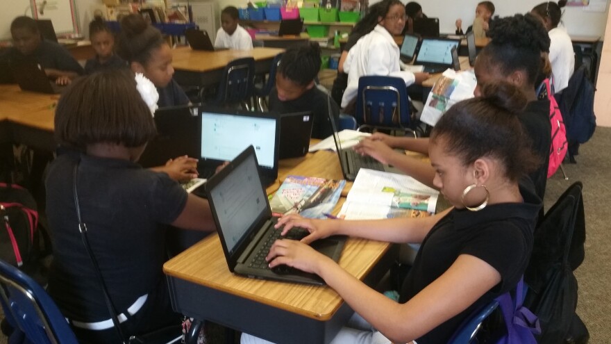 Fifth-graders at Mariam Boyd Elementary in Warrenton, North Carolina, use Chromebooks to answer questions about a story they’re reading. Their teacher, Charis Shattuck, says the technology allows her to review her students’ work in real-time and give them