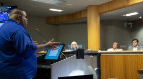 East Gainesville resident Armando Grundy addresses the joint commission on Thursday night to voice his support of developing the Waldo Road site discussed during the meeting. (Shelbie Eakins/WUFT News)