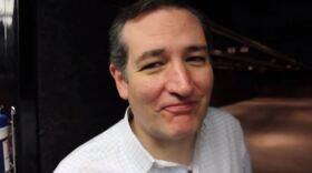 Presidential candidate Ted Cruz trying bacon — made on a machine gun — at the end of a new video.