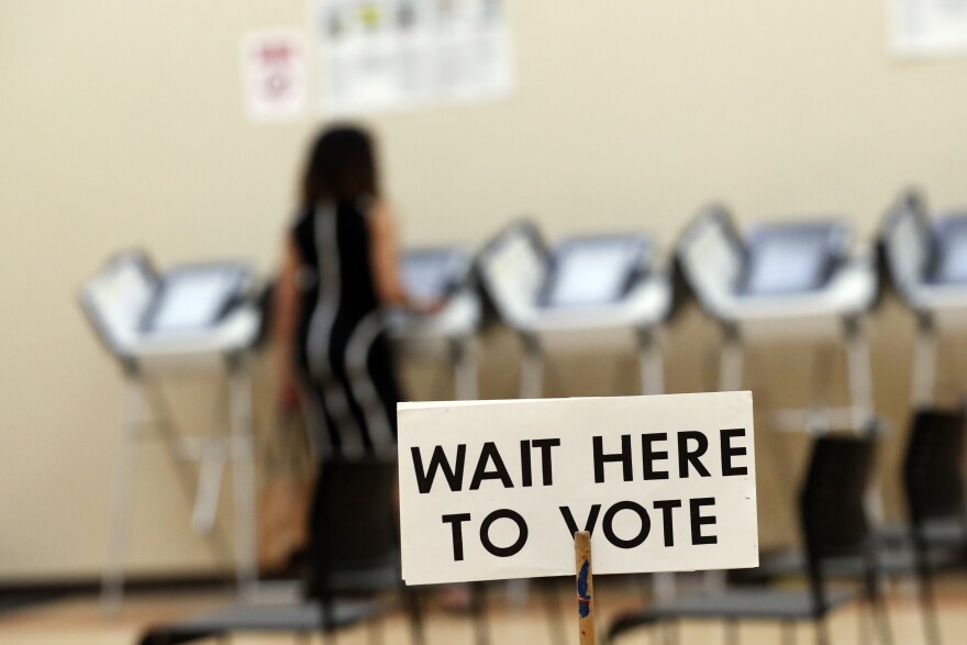 A voter in Sandy Springs, Ga. on May 9, 2018. Georgia is one of 14 states that use electronic voting machines that don't produce a paper trail to verify results, which concerns many security experts.