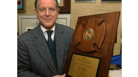 Former Herald-Times owner Scott Schurz holds his HSPA 2002 award, April 2003.