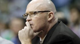FILE - In this March 1, 2016, file photo, Orlando Magic head coach Scott Skiles watches play late in the second half of an NBA basketball game against the Dallas Mavericks, in Dallas. Skiles has stepped down as coach of the Magic. Skiles was 35-47 this season, his lone year leading the Magic. The team made the surprising announcement Thursday morning, May 12, 2016, saying Skiles informed them that he would not be returning. (AP Photo/Tony Gutierrez, File)