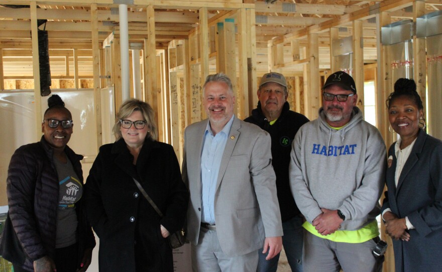 (Left to right) Homeowner Nikkita Newell, Lea Anne Schmdigall (Executive Director of Habitat for Humanity Greater Peoria Area,) Congressman Eric Sorensen, two Habitat for Humanity volunteers and Councilwoman Denise Jackson.