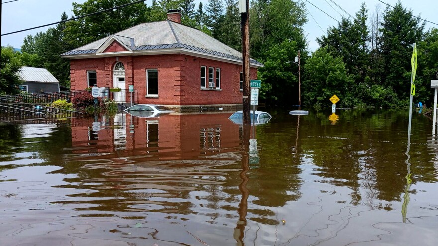 Photo of Johnson Library in flooded street