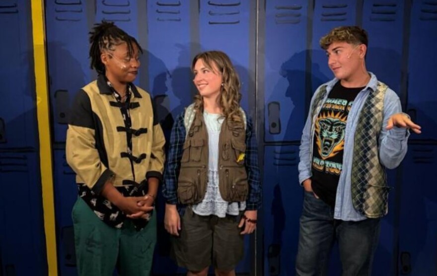 Baylee Parker, Ryenne Lacher, and Micah Roldan in Mean Girls.