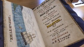 The log book of the whaling vessel Marcella out of New Bedford at the Providence Public Library, which owns one of the five largest collections of whaling log books in the country. (Jesse Costa/WBUR)