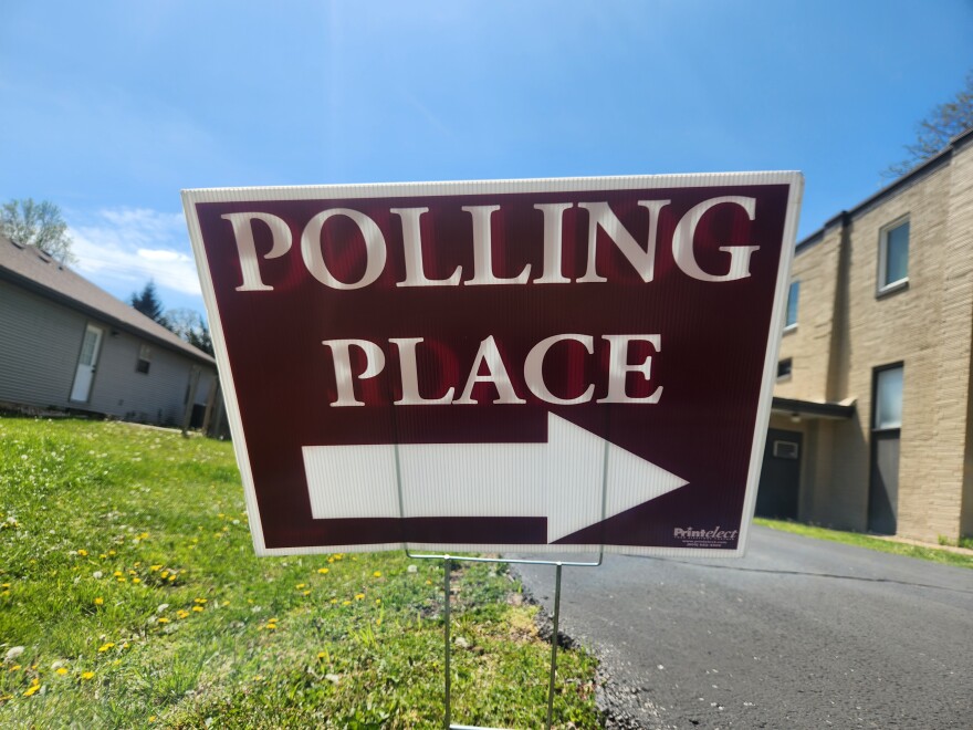 A sign pointing to a polling location in Springfield, Mo. on April 7, 2026.