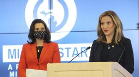 Michigan Secretary of State Jocelyn Benson (right) and Governor Gretchen Whitmer.