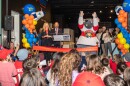 A rat mascot excited a crowd of children at a ribbon cutting ceremony