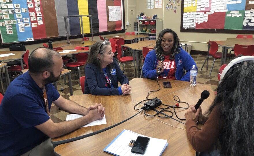 TPR's Norma Martinez interviewing educators at San Antonio's Jefferson High school. From left to right: Mexican American Studies teacher, Alejandro Johnson; U.S. History teacher and department chair, Monica Rodriguez; and International Baccalaureate Campus Coordinator, Jennifer Love.