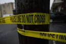 Police tape cordons off the scene of a fatal shooting in Philadelphia, Friday, April 28, 2023. (AP Photo/Matt Rourke)