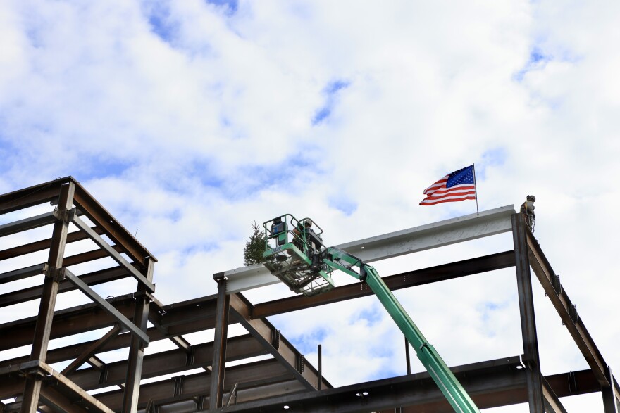 The last beam is put in place for Cape Cod Hospital's new tower for oncology and cardiology care.