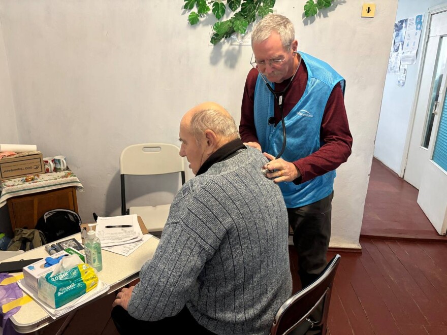 Colorado physician assistant Bob Downs treating a patient in Ukraine in December.