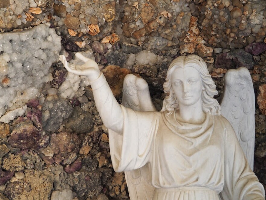 Father Paul Matthias Dobberstein designed his agate mountain from the story of shepherds who carved out places of worship from caves and crevices and then decked out their grottos with whatever religious iconography they could create from the caves themselves.