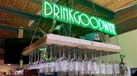 A neon sign hangs above the bar at The Little House in New Orleans on January 20, 2025.