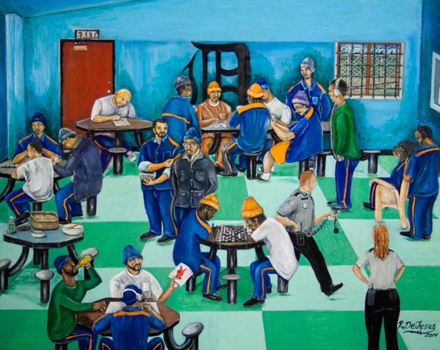 An oil painting of the inside of a cafeteria area in a Michigan prison. The floor of the painting is checkered in light and dark greens. The inmates are sitting around circular tables. Some are wearing blue hats and blue jackets while others wear white tshirts and yellow hats. There's a red door painted on the back left side of the room and two white prison guards. The majority of the inmates appear to have tan, brown or black skin. 