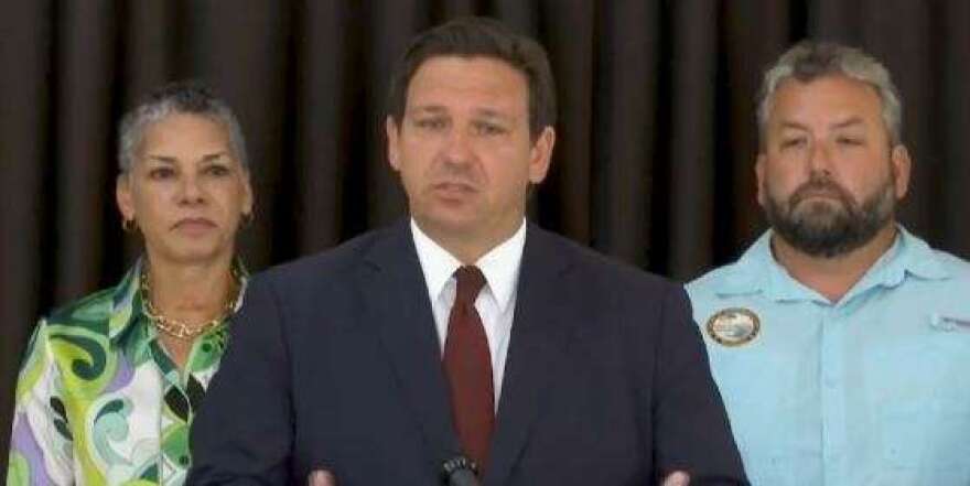 Gov. Ron DeSantis at a press conference in Cape Coral July 8, flanked by Agency for Health Care Administration Secretary Simone Marstiller and Florida State Rep. Adam Botana (R-Bonita Springs) (photo: The Florida Channel)