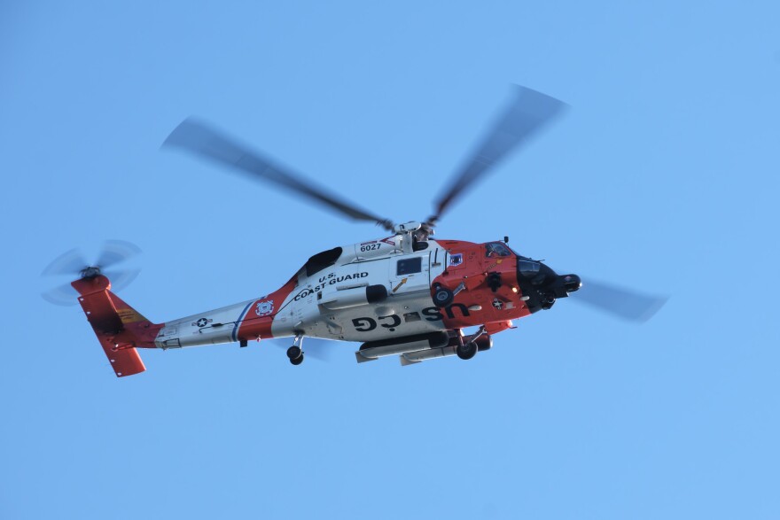 A United States Coast Guard helicopter flying over Kodiak, February 19, 2023. (Brian Venua/KMXT)