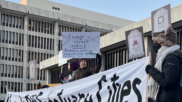 Dozens of demonstrators who rallied on Monday evening, March 2, 2026, outside the Kenneth B. Keating Federal Building and U.S. Courthouse on State Street in downtown Rochester.