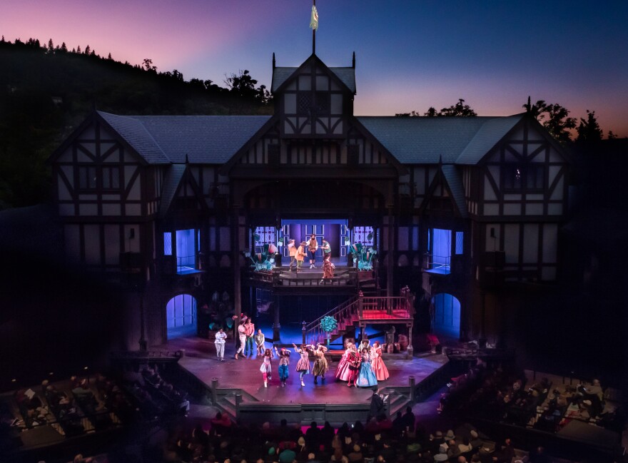 Open to the sky, the Oregon Shakespeare Festival's outdoor Allen Elizabethan Theatre seats 1,200 people. Featured in the photo is the 2017 set and ensemble in The Merry Wives of Windsor.