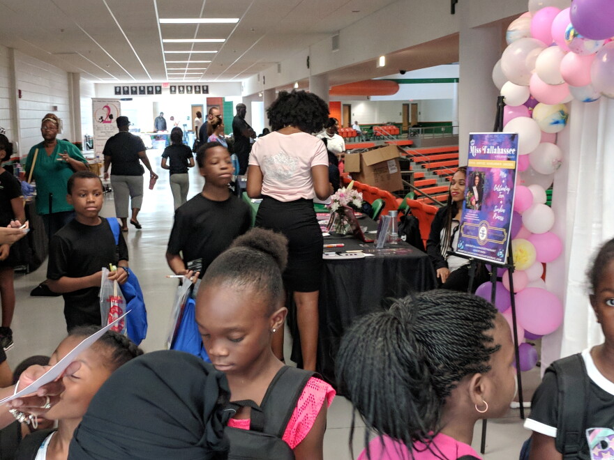 Students jam the mezzanine level of FAMU's Lawson Center to check out various vendors and information booths.