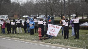 About two dozen people protested outside of the Immigration and Customs Enforcement field office in Westerville on December 19, 2025.