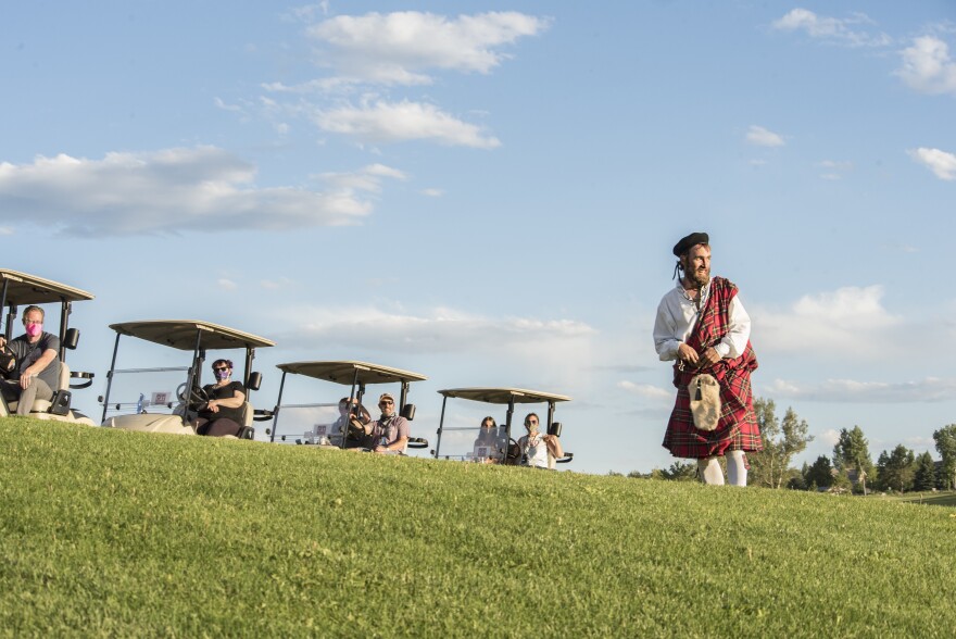 The Catamounts' play "The Rough" was showcased on a golf course. In a scene featuring actor Brian Kusic, patrons ride past in golf carts.