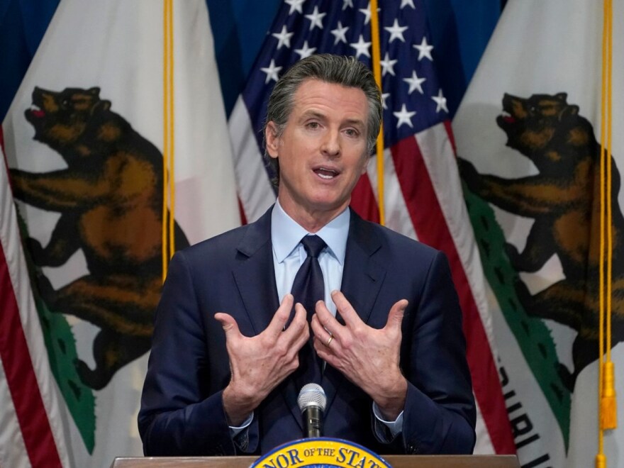 In this Jan. 8, 2021, file photo, California Gov. Gavin Newsom gestures during a news conference in Sacramento, Calif.