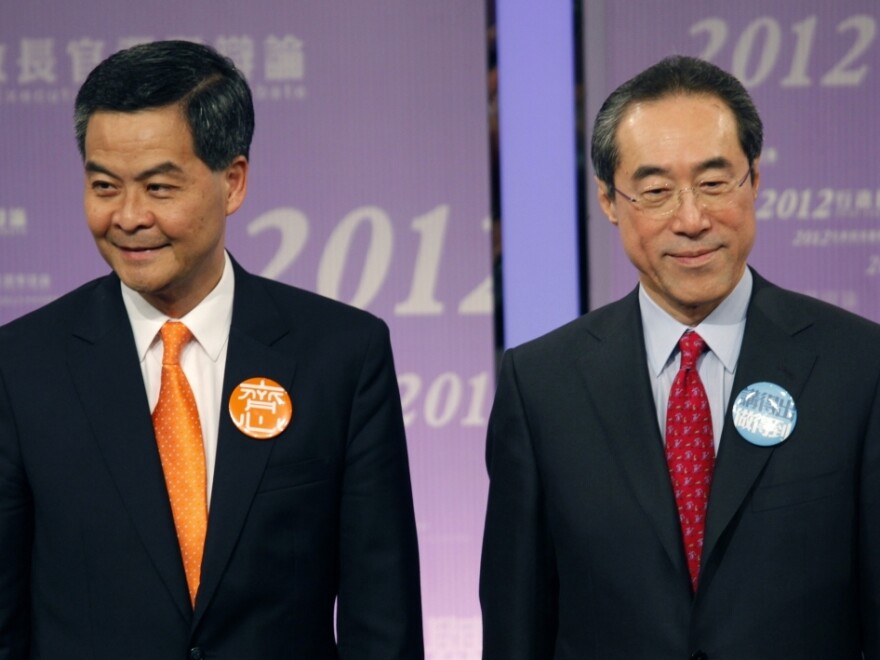 Former convener of Hong Kong's Executive Council Leung Chun-ying (left) and former Hong Kong Chief Secretary Henry Tang (shown here March 16) are the leading candidates to be Hong Kong's next leader, who will be chosen March 25 by a Beijing-selected committee.