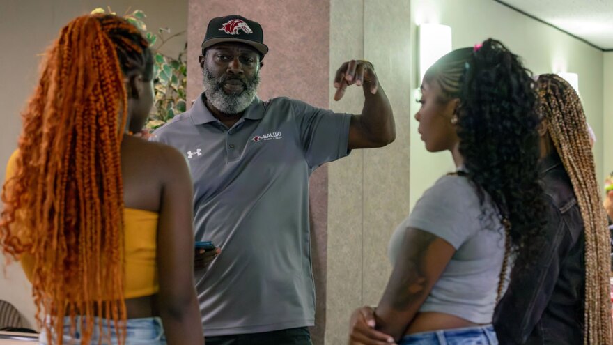 Richard Jones, SIU director of track & field and cross country, speaks with Bryson Scholars