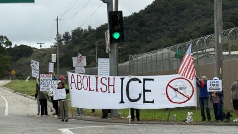 The protest along Highway 1 was organizes by the groups Cambria Indivisible and SLO 50501.