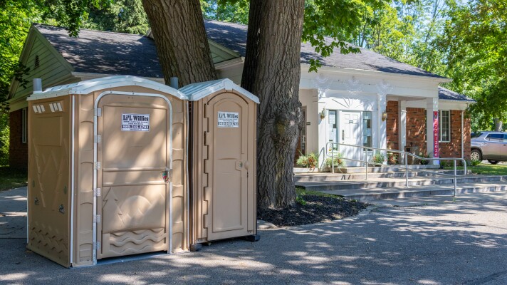 Porta johns are stationed outside of Gladwin's city hall after a storm damaged the local wastewater treatment plant, temporarily making it unsafe to use indoor plumbing facilities.