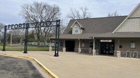 The entrance to the Peoria Zoo in Glen Oak Park, vacant after the initial early morning rush of schoolchildren and families to enter.