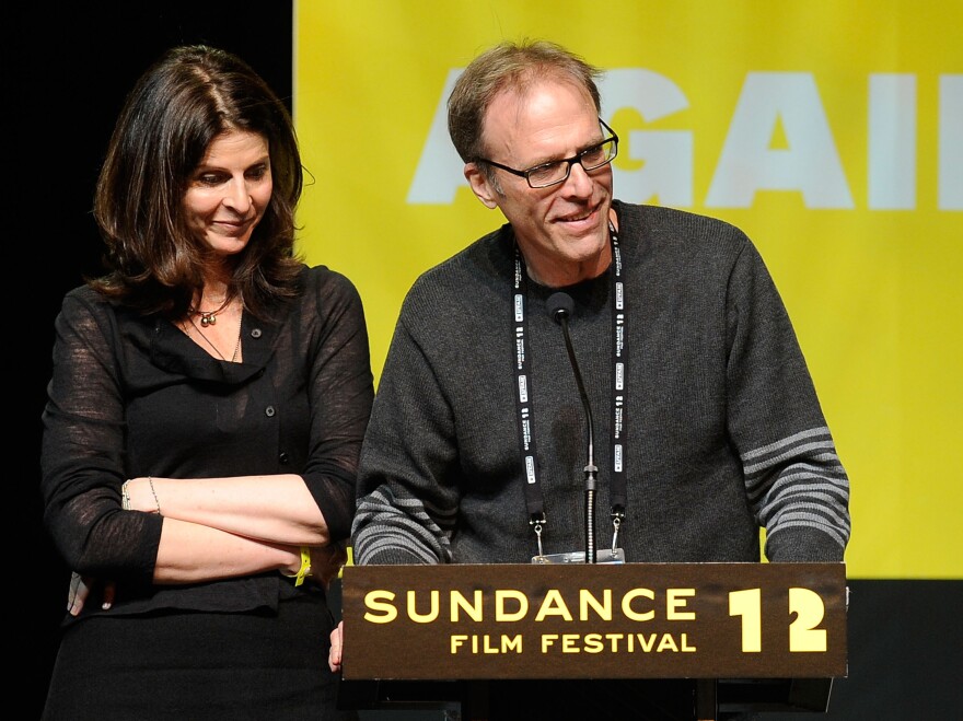 Producer Amy Ziering and Director Kirby Dick accept an award at this year's Sundance Film Festival for their documentary <em>The Invisible War</em>, which looks at sex crimes in the military.